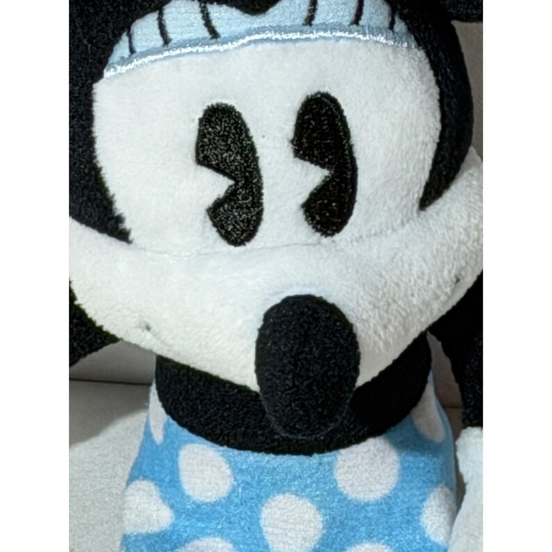 Peluche di Minnie Mouse Disney, gonna a pois blu e cappello rosso con margherite, 20 cm circa. immagine 4