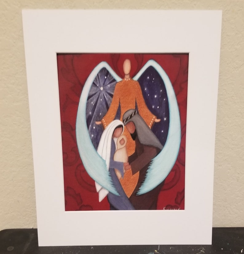 May include: A painting of the Holy Family with an angel's wings surrounding them. The angel is depicted in orange, the mother in blue, the father in gray, and the baby in white. The background is a deep red with a star in the sky.
