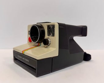 Cámara instantánea Polaroid White Rainbow Stripe - Película de 600 convertida
