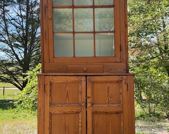 Antique pine cabinet with glass door