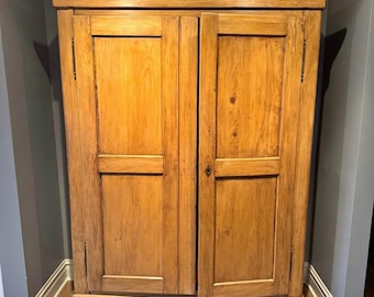 An Antique European knock down  armoire cabinet