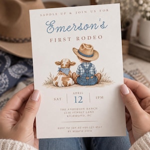 May include: A rectangular invitation card featuring the text SADDLE UP & JOIN US FOR Emerson's FIRST RODEO. The illustration shows a child in a cowboy hat and overalls sitting next to a calf with a blue bandana. Includes date, time, and location details.