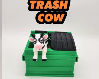 Juguete de escritorio impreso en 3D con forma de vaca de basura