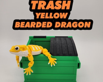 Juguete de escritorio impreso en 3D con forma de dragón barbudo amarillo basura