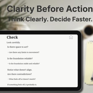 May include: A digital tablet displays the text "Clarity Before Action" and "Think Clearly. Decide Faster." The screen shows a checklist with questions like "Is there space to act?" and "Is the foundation reliable?" A notepad and pen are in the background.