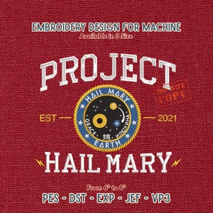 May include: Red embroidery design for machine with the text "PROJECT HAIL MARY" in white. The design includes a circular emblem with stars, the words "GRACE EARTH ИЛЮХИНА", and the text "EST 2021". Available in 3 sizes, from 6" to 8".