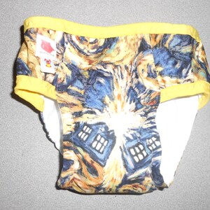May include: Yellow and white patterned underwear with a yellow elastic waistband. The pattern features a blue and yellow abstract design.