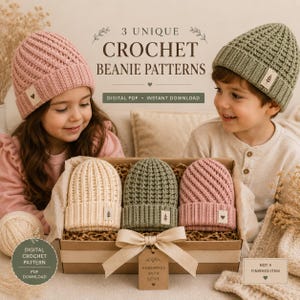May include: A set of three crochet beanies in cream, sage green, and dusty rose, presented in a cardboard box with a beige ribbon. The beanies feature ribbed textures and small rectangular labels. Text reads 3 UNIQUE CROCHET BEANIE PATTERNS.