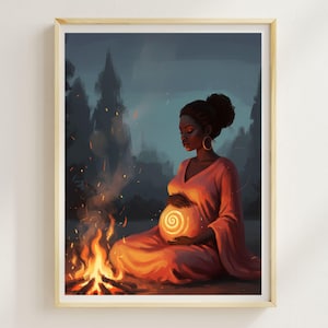 May include: Framed art print showing a pregnant person in an orange dress, seated by a campfire. The person's belly glows with a spiral design. The background features dark trees and a dusky sky, creating a serene, spiritual scene.