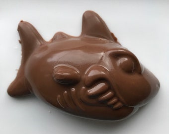 6 Solid Chocolate Sharks individually wrapped approximately 1/4 pound of chocolate each