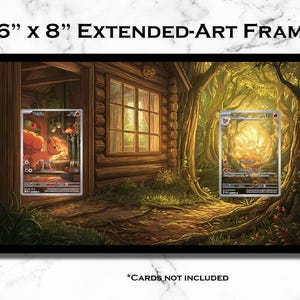 May include: Black framed 16" x 8" Extended-Art Frame featuring a forest scene with a cabin and two card illustrations. The frame has a black border and the text "*CARDS NOT INCLUDED".