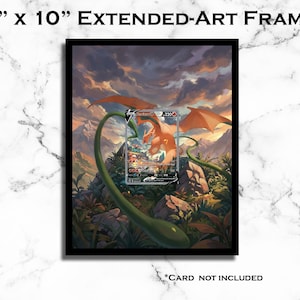 May include: An 8" x 10" extended-art frame with a black border. The artwork features a Charizard card with orange wings and a green vine. The background shows a mountain landscape with a cloudy sky. Text at the bottom reads "*CARD NOT INCLUDED."