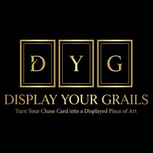 May include: A black logo featuring three gold-outlined rectangular frames containing the letters D, Y, and G in gold. Below, the text DISPLAY YOUR GRAILS appears in gold, followed by the tagline Turn Your Chase Card into a Displayed Piece of Art.