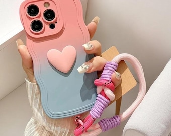 Custodia per iPhone con motivo a cuore sfumato, cordino a forma di cartone animato, cover in TPU morbido