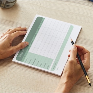 May include: A handmade wooden sign with the text "Welcome" in a playful font. The sign features a distressed white background and a dark brown border, perfect for a front door or entryway. Measures approximately 12 inches wide.