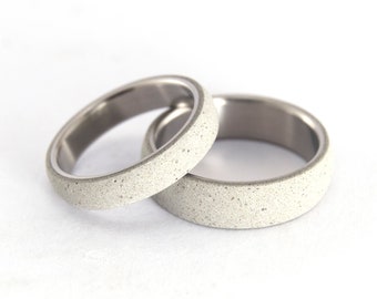 Titanium and gray concrete wedding ring set. Rounded matching wedding bands. (00706_4N6N)