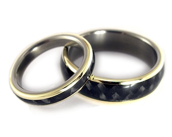 Set of Titanium and 18ct yellow gold rings with carbon fiber inlay. Black and gold wedding rings. (04719_4N6N)