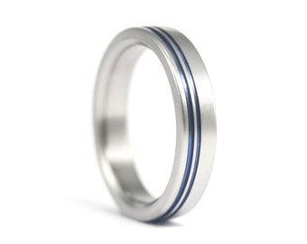 Matte titanium ring with blue anodized inlays. Flat womens wedding ring. Titanium engagement ring for her. (00014_4N)