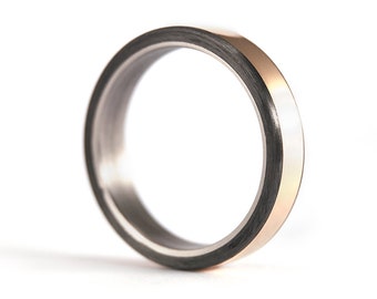 Titanium and yellow gold 18K ring with carbon fiber inlays. Flat matte women's wedding bands. Black and gold ring for her (00556_4N)