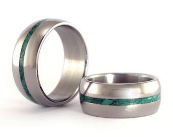 Titanium wedding bands with central inlay of Malachite semi precious stone. Green rounded titanium matching wedding rings. (03235_8N8N)