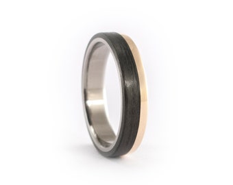 Titanium with carbon fiber and yellow gold 18K ring for her. Black and gold flat women's wedding band. Gold engagement ring (00424_4N)