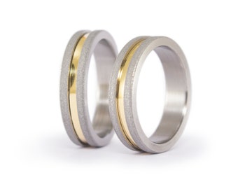 Sandblasted titanium and yellow gold 18ct wedding ring set. Sandblasted flat  titanium matching wedding bands. Golden rings (05590_5N5N)