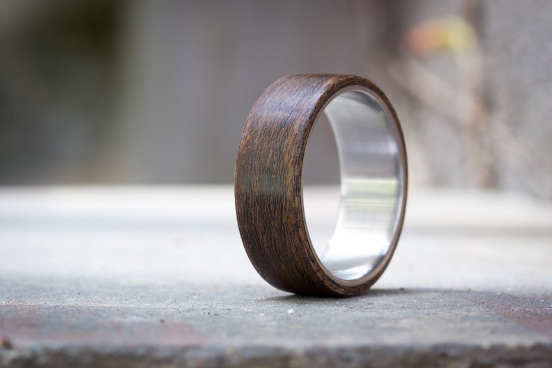 Water resistant very durable and hypoallergenic. Unique wooden wedding band Men/'s titanium and bentwood ring 00515/_7N