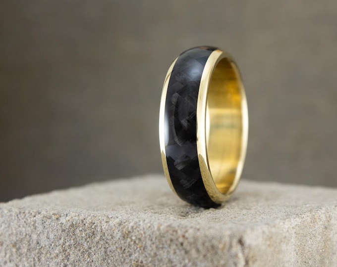 18K yellow gold ring with polished carbon fiber band. Black and gold wedding ring. Rounded golden engagement ring  (04709_7N)