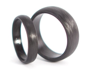 Set of two carbon fiber round wedding bands. Unique and modern black rings. Water resistant, very durable and hypoallergenic. (00100_4N7N)