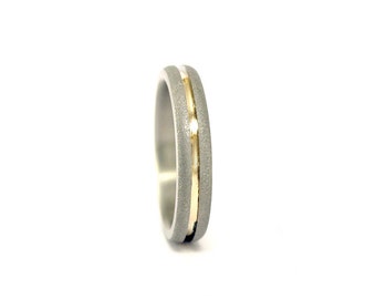 Sandblasted titanium and yellow gold 18ct ring. Sandblasted rounded band. Golden engagement ring (01558_4N)