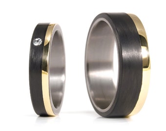 Titanium, carbon fiber and yellow gold 18K matte wedding ring set. Black flat matching bands with Swarovski crystal.  (00424_4S1_7N)