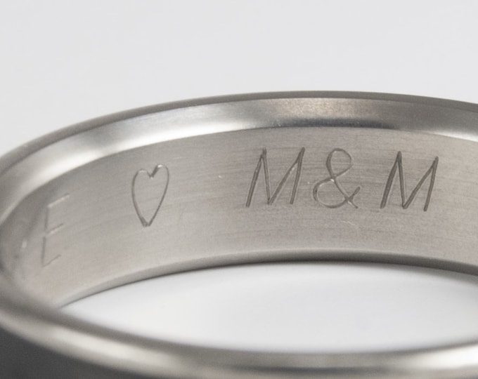 Engraving for one (1) ring