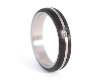 Titanium and carbon fiber ring with Swarovski crystal. Black wedding band for her. Titanium and carbon fiber womens wedding ring (00304_4S1)