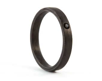 Matte carbon fiber ring for her. Black womens wedding band with black diamond. Flat carbon fiber engagement ring with diamond (00101_4Dn)