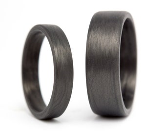 Matte carbon fiber wedding ring set. Black matching wedding bands. Flat his and hers alternative rings. (00101_4N7N)