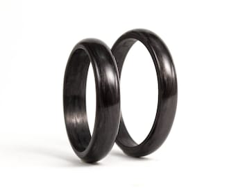 Polished carbon fiber wedding ring set. Black matching wedding bands. Carbon fiber round his and hers engagement bands ( (00122_3N4N)