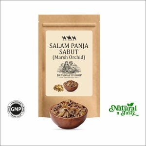 May include: A brown paper bag with the text "SALAM PANJA SABUT (Marsh Orchid)" and a logo. A wooden bowl filled with dried marsh orchid is in front of the bag. The words "Natural n Tasty" are in green.