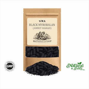 May include: A brown paper bag with a clear window displaying black myrobalan. The label reads "BLACK MYROBALAN (AMRIT HARAD)" with the text "BKPSONSETSYSHOP RAJASTHAN INDIA". A pile of black myrobalan sits below the bag. The text "Natural n Tasty" is on the right.