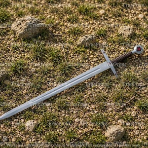 May include: A double-edged steel sword featuring a straight crossguard, a dark brown leather-wrapped grip, and a round pommel with a red cross emblem. The blade is pointed and metallic silver, extending from the hilt to a sharp tip.