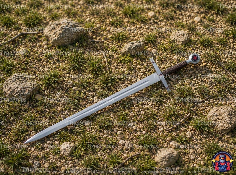 May include: A double-edged steel sword featuring a straight crossguard, a dark brown leather-wrapped grip, and a round pommel with a red cross emblem. The blade is pointed and metallic silver, extending from the hilt to a sharp tip.