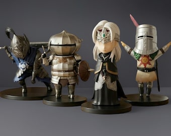 Conjunto de figuras chibi de Dark Souls: Artorias, Guardián del Fuego, Siegward y Solaire.