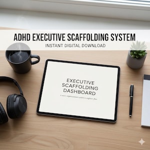 May include: A digital tablet displays the text "EXECUTIVE SCAFFOLDING DASHBOARD" on a wooden surface. The text "ADHD EXECUTIVE SCAFFOLDING SYSTEM" and "INSTANT DIGITAL DOWNLOAD" are above the tablet. A black mug, headphones, pen, and notepad are also on the table.