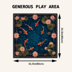 May include: A square mat with a koi pond design. The mat features orange koi fish swimming in blue water, surrounded by pink lotus flowers and green lily pads. The mat measures 80cm on each side, with the text "GENEROUS PLAY AREA" at the top.