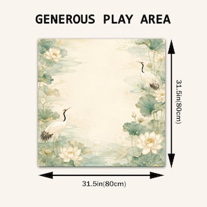 May include: A square play mat featuring a watercolor-style illustration of white cranes and lotus flowers in shades of green and cream. The text 'GENEROUS PLAY AREA' is at the top. It measures 31.5 inches by 31.5 inches as indicated by arrows.