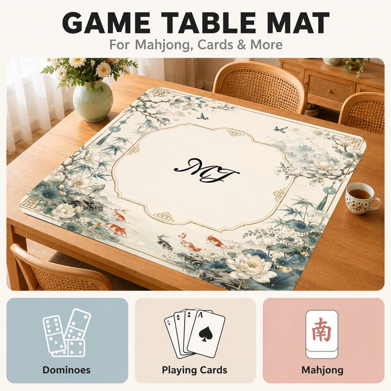 May include: A square game table mat featuring a cream-colored center with the letters MJ, surrounded by a border of koi fish, lotus flowers, and bamboo. The mat includes text reading GAME TABLE MAT For Mahjong, Cards & More, plus icons for dominoes, playing cards, and mahjong tiles.