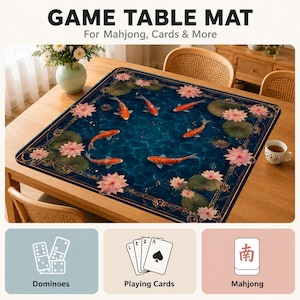 May include: A rectangular game table mat featuring a blue water design with koi carp and lotus flowers. The mat is labelled "GAME TABLE MAT" and is suitable for Mahjong, cards, and dominoes.