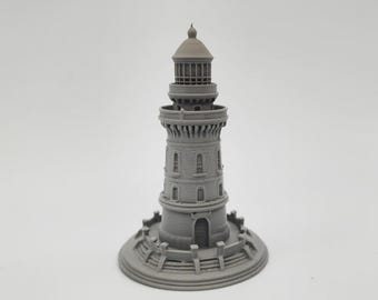 May include: A gray, 3D-printed model of a lighthouse. The lighthouse features a detailed design with a cylindrical tower, windows, and a lantern room at the top. The base has a decorative railing. The model is made of a solid, light gray material.