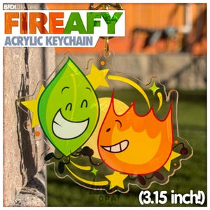 May include: A clear acrylic keyring featuring the characters Leafy and Firey from BFDI. The design includes a green leaf character and an orange flame character surrounded by yellow stars. The text reads BFDI FIREAFY ACRYLIC KEYCHAIN (8 cm!).