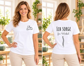 May include: A white short-sleeved t-shirt featuring black text on the front that reads Physio Hannah. The back of the shirt displays the black text Ich Sorge für Wirbel above a graphic illustration of a human spinal column.