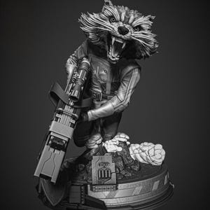 May include: A grayscale figurine of Rocket Raccoon from Guardians of the Galaxy. The figure is in a dynamic pose, holding a large weapon and snarling. The base features detailed textures and a futuristic design, with a dark background.